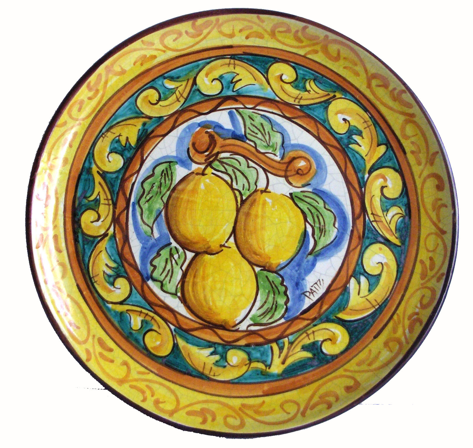 Piatto con limoni, colori giallo, verde ed arancio